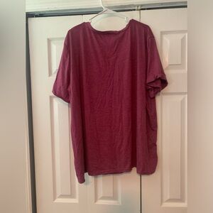 Size is 5xl fits more like a 4xl brand new purple color comes in bag